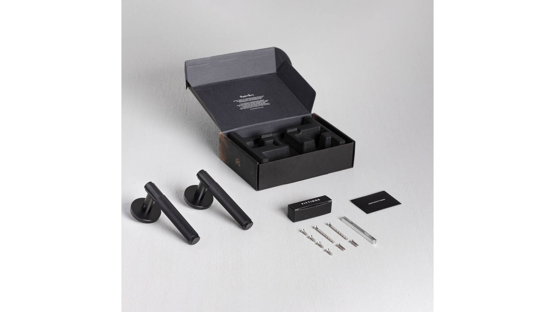 Door Handle Set/Unsprung/Cross/Black
