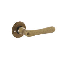 Deurkruk Trento met ronde rozet ø50x5 mm messing getrommeld